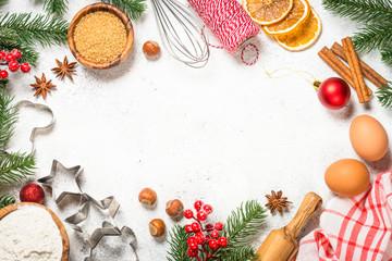 Christmas baking background on white table.