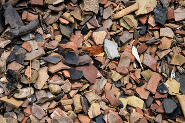 Image of the wreckage of a large number of ancient pottery. Fragments of amphorae.