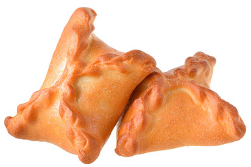 Baked pasties close-up isolated