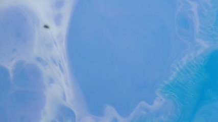 Abstract liquid ink painting texture. purple and blue color swirl marble background. 