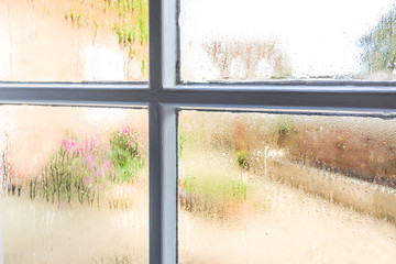 Condensation on window panes of an old sash window