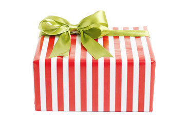 Christmas gift box with green bow on white