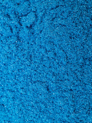 Fototapeta na wymiar blue bath powder, bath foam. cosmetic texture. selective focus.