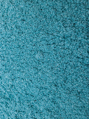 Fototapeta na wymiar blue bath powder, bath foam. cosmetic texture. selective focus.