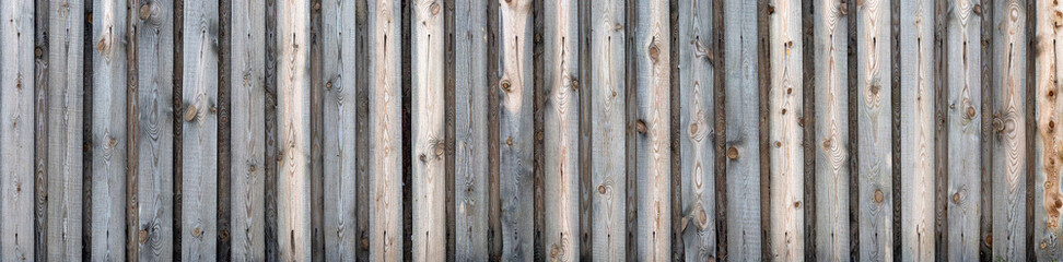 Old natural long wooden planks texture panorama. Wooden nature boardwalk decking surface pattern seamless. Brown wood texture with vertical lines of bars