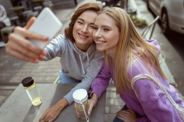 Cute longhaired female person demonstrating her smile
