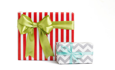 Christmas gift boxes decorated with ribbon bow on white background