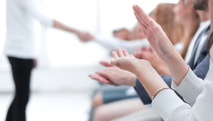 background image of a young business team applauding
