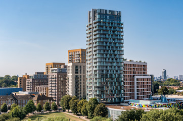 Fototapeta na wymiar London / United Kingdom - August 26th 2019: Skyline of London from Lewisham Shopping Centre showing the Renaissance apartment complex in foreground