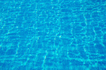 surface of blue swimming pool,background of water in swimming pool.