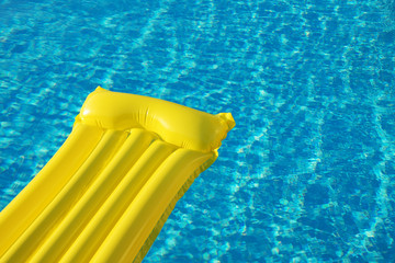 Air Mattress On The Water In The Pool