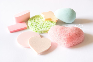 Assorted cosmetic sponges.