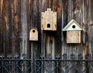 Birdhouses on old wooden wall of barn in Virginia