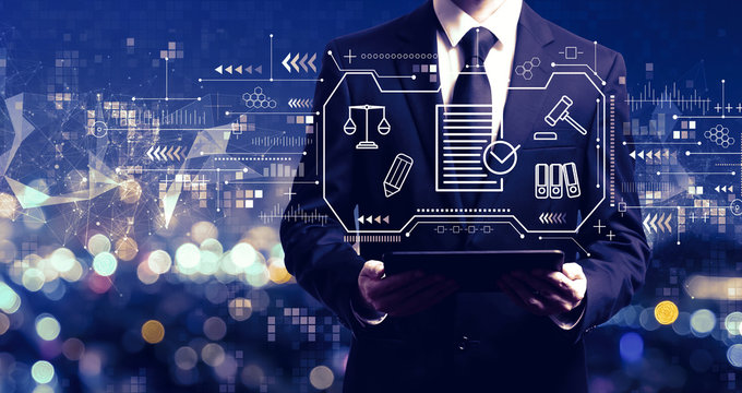 Compliance theme with businessman holding a tablet computer