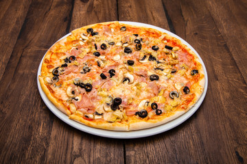 classic Italian pizza on a wooden table