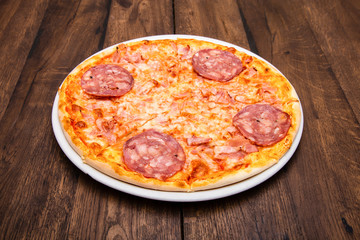 classic Italian pizza on a wooden table