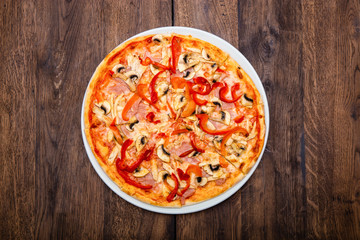 classic Italian pizza on a wooden table - 301633213