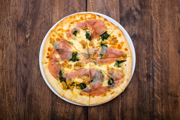 classic Italian pizza on a wooden table
