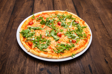 classic Italian pizza on a wooden table