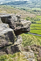 Curbar Gap and Frogatt Edge Hope Valley, Derbyshire Peak District - outdoors for rambling, hiking, and walking. Carboniferous stone boulders, heather and grit rock formations. 