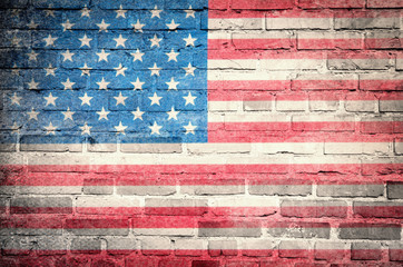 Grunge USA flag on brick wall background