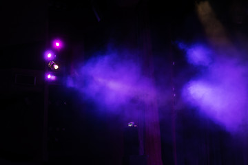 Stage lights. Background in show. Light spotlight in the dark. The interior of the theater scene is...