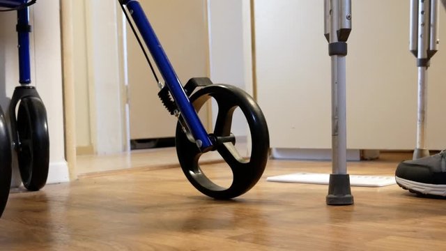 Person Uses Crutches Walking Away