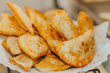 frying homemade pastries at home, brazilian cultural salty food