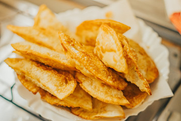 frying homemade pastries at home, brazilian cultural salty food