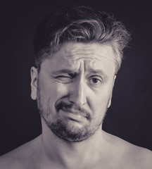 Face emotions of a man