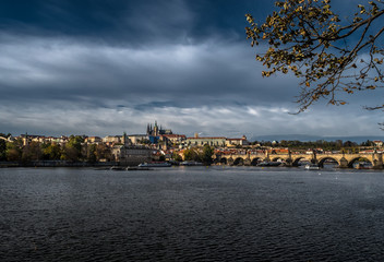 Fototapeta na wymiar Charles Bridge Over Moldova River And Hradcany Castle In Prague In The Czech Republic