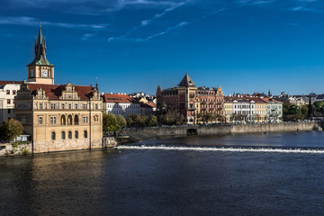 Moldova River And Historic Buildings In Prague In The Czech Republic