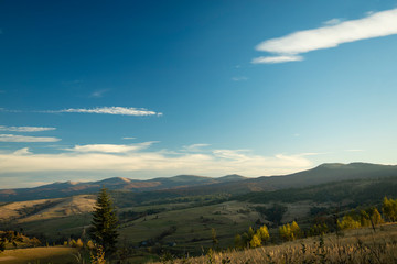 panorama mountain ridge on blue sky background European scenery landscape majestic highland view in morning sun rise atmospheric clear weather time, copy space for text