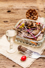 Pickled (fermented) mushrooms. Traditional New Year (Christmas) snack. Festive table cutlery setting