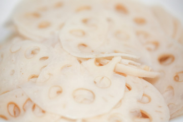 Slices of fresh lotus root on white background - isolated (Asian ingredients) - Image