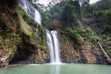 Fototapeta na wymiar Amazing crystalline Blue water Salto de La India Waterfall in Santander, Colombia. Long Exposure