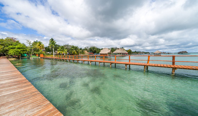 hut and pier to Bacalar laguna , Mexico