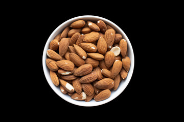 small white dish full of almonds