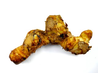 Brown galangal isolated from a white background