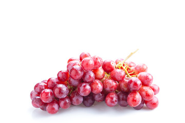 Fresh red bunch of grapes isolated on white background