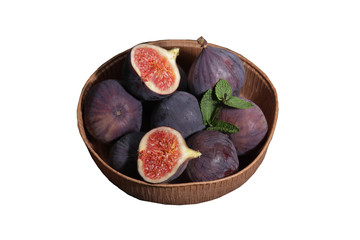 fig fruits on the brown plate isolated on white background