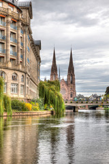 Fototapeta na wymiar Church in Strasbourg, France on the canal