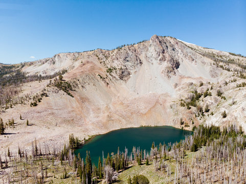 aerial view of lake in mountains