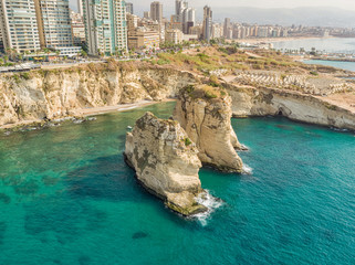 Fototapeta premium Rouche rocks in Beirut, Lebanon in the sea during daytime. Pigeon Rocks in Mediterranean sea.