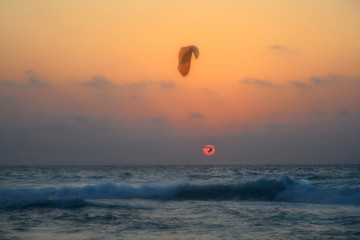 Kite boarders, Extreme sport, sunset, orange, yellow, red, surf, ocean, water, windsurfing, watersport, dusk, kiteboarding, difficult tricks, action, active, adrenaline, air, athletic, boarding, coast