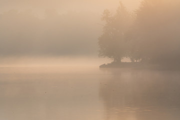 Obraz na płótnie Canvas fog over river in the morning