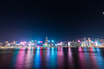 Bright Hong Kong skyline at night.
