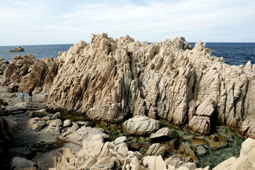 rocks and blue sea, bay in Costa Paradiso, Sardinia Italy