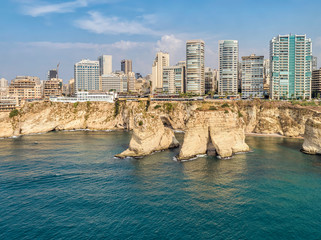 Fototapeta premium Rouche rocks in Beirut, Lebanon in the sea during daytime. Pigeon Rocks in Mediterranean sea.