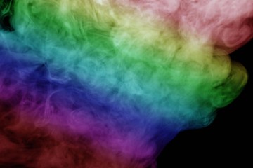 Abstract colorful smoke isolated on black background,Rainbow powder